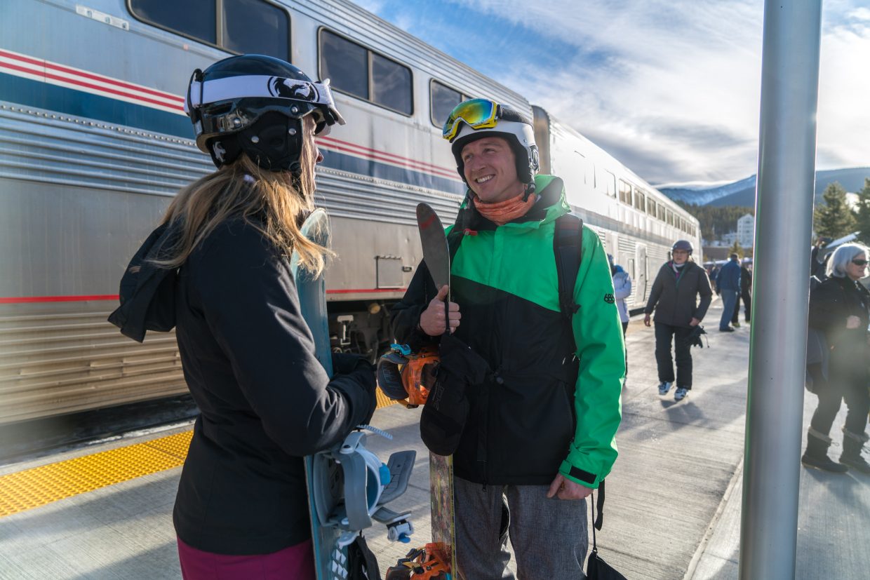 Skiers chat after unloading from the Winter Park Express on Friday. (Photo by Carl Frey/Winter Park Resort)