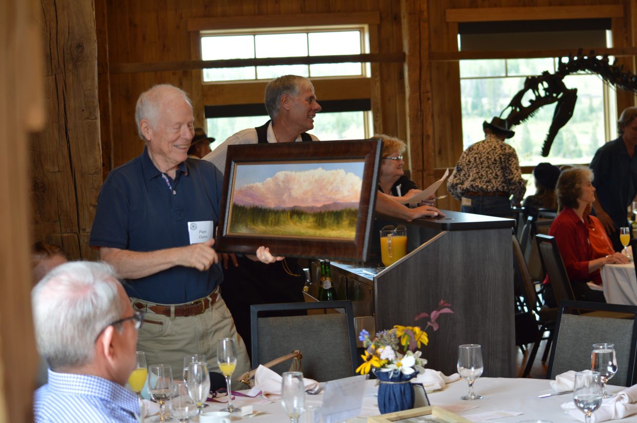 Local artist Pem Dunn helped auction his work 