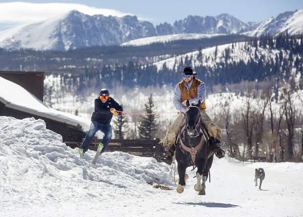 The Summit County brotherly skijoring duo of Vinny (skiing) and AJ Pestello (horseback) practice for the upcoming weekend's 71st annual skijoring event in Leadville on the jumps they built themselves at Pass Creek Ranch near Ute Pass north of Silverthorne, on Wednesday, Feb. 27.
