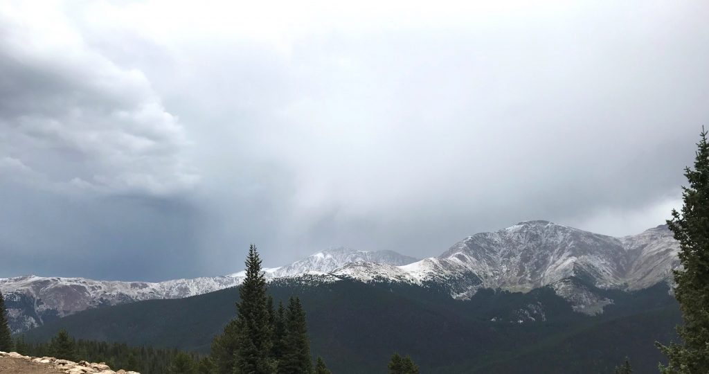 This photo taken at Winter Park Resort shows new snow coloring the nearby mountains along the Continental Divide on Friday.