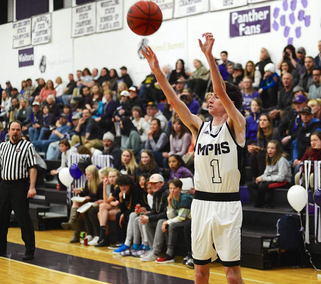 Panthers senior Jacob Smith knocks down a 3-pointer Tuesday vs. Bennett in the Class 3A district tournament. Middle Park won 77-51 at home.