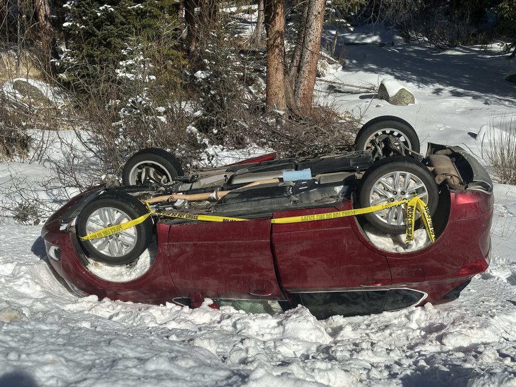 Car flips onto bank of Vasquez Creek
