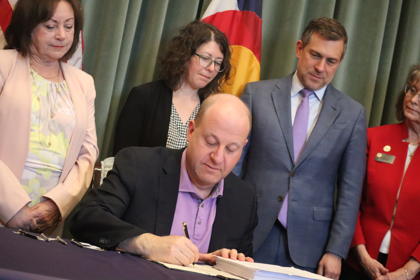 Colorado Gov. Jared Polis signs state budget, with Medicaid taking ...