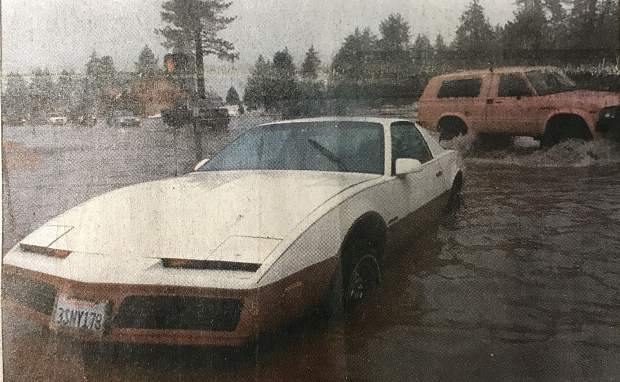 An abandoned car sits in the intersection of Wildwood Avenue and U.S. 50 as many streets in the basin were severely flooded on Wednesday, Jan. 1, 1997.