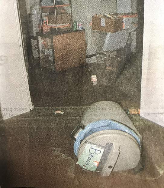 The Christmas Cheer food pantry started off 1997 with 8 inches of water on the floor Wednesday, Jan. 1, 1997. Many South Shore streets, including Fairway Avenue, were flooded.