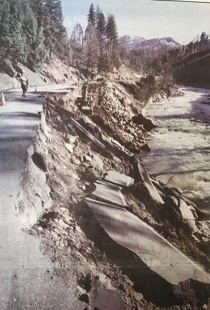 Road repair crews work on a 100-foot section of U.S. 50 that collapsed into teh Amreican River during the flood in early January 1997.
