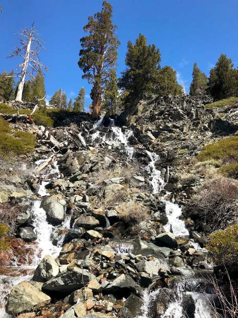 A small waterfall on the hike to Susie Lake made by melting snow.