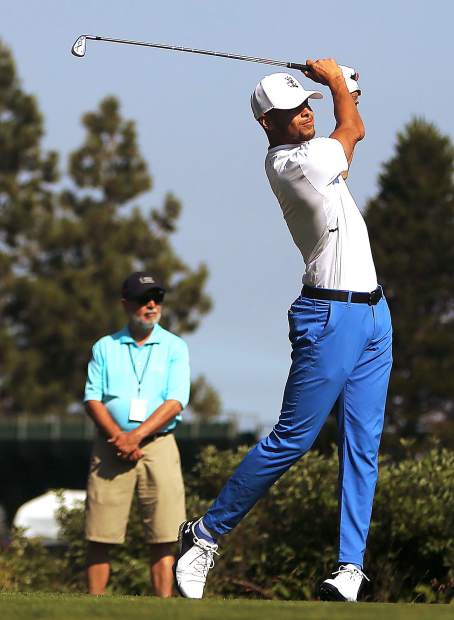 Steph Curry of the Golden State Warriors watches his tee shot during the final round of the American Century Championship last year.