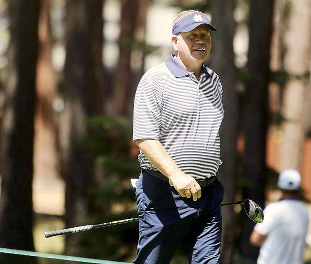 Notre Dame football coach Brian Kelly walks to the next tee box during the final round of the 2018 American Century Championship.