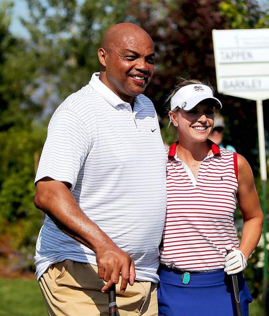 NBA Hall of Famer Charles Barkley and Kathryn Tappen smile before the final round of the 2018 American Century Championship.
