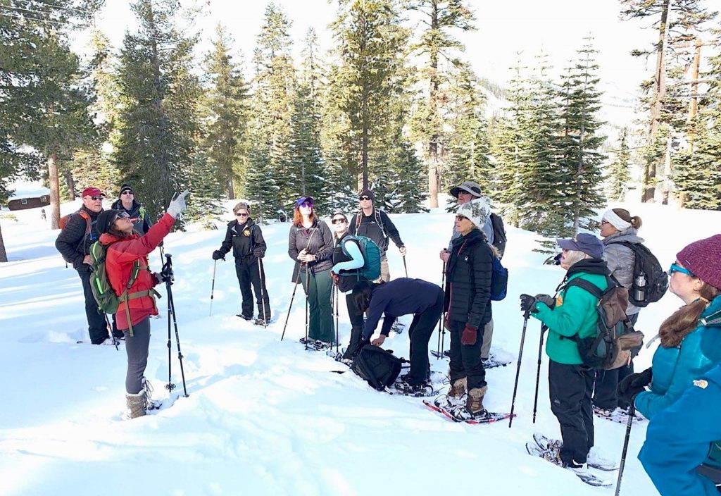 Sugar Pine Foundation taking guests on Echo Lake snowshoe trek